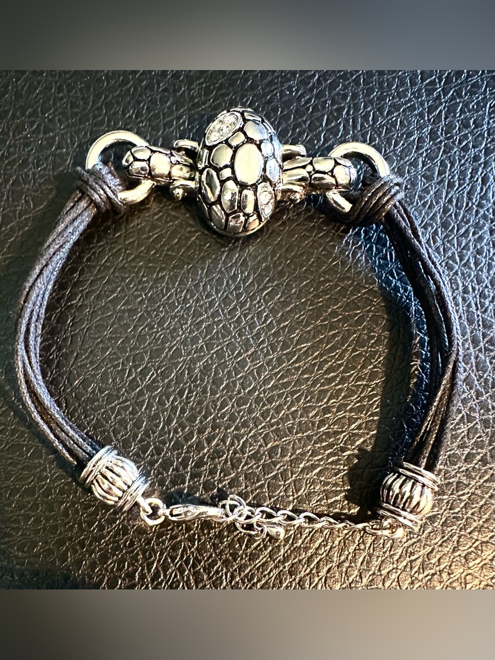 Silver Floral Oval Accent Black Cord Bracelet